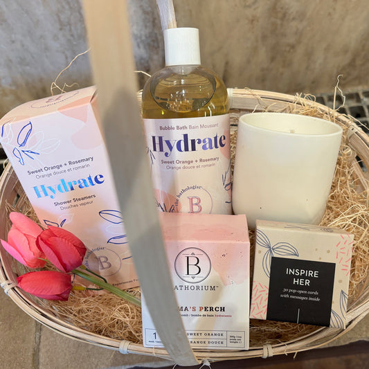Overhead view of the Ease Mother's Day Basket filled with spa products